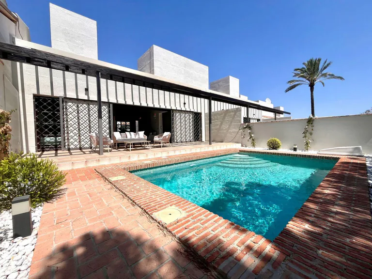 Elegantes adosados de una planta con piscina privada en Peraleja Golf Resort - Costa Cálida