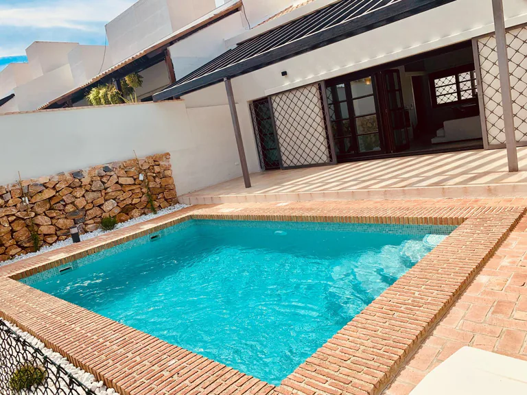 Elegantes adosados de una planta con piscina privada en Peraleja Golf Resort - Costa Cálida
